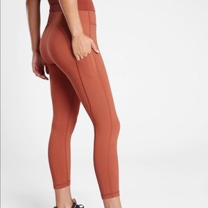 Athleta rust terracotta colored leggings xs